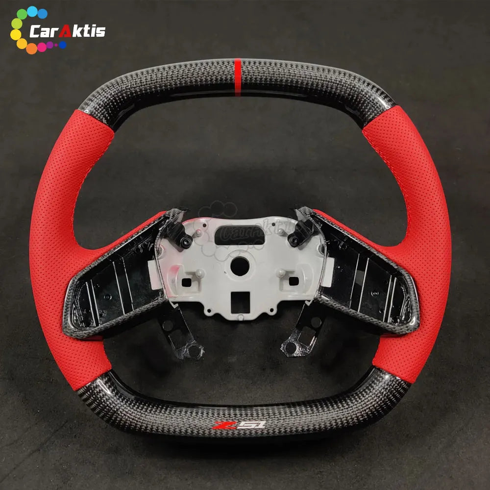 Top view of a C8 Corvette steering wheel with a racing-style red 12 o&