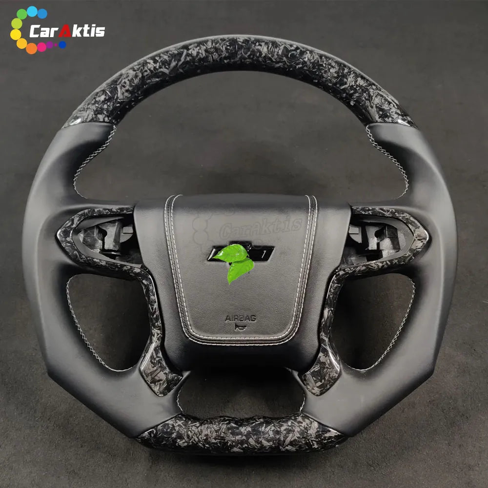 Custom 2014-2020 Chevy Silverado steering wheel featuring marbled black forged carbon fiber and premium black genuine leather grips.