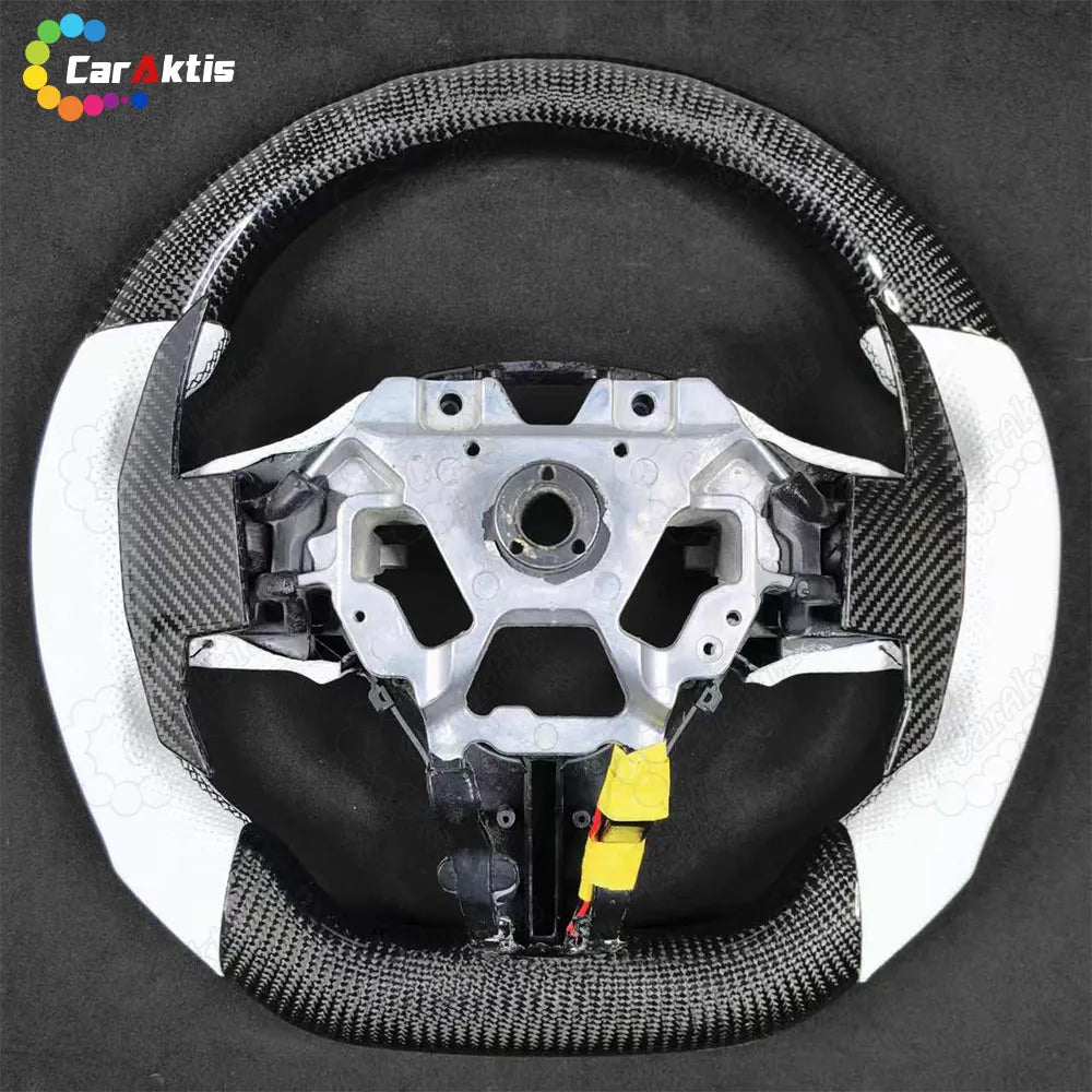 Custom extended carbon fiber paddle shifters for enhanced racing ergonomics and sportier interior styling.