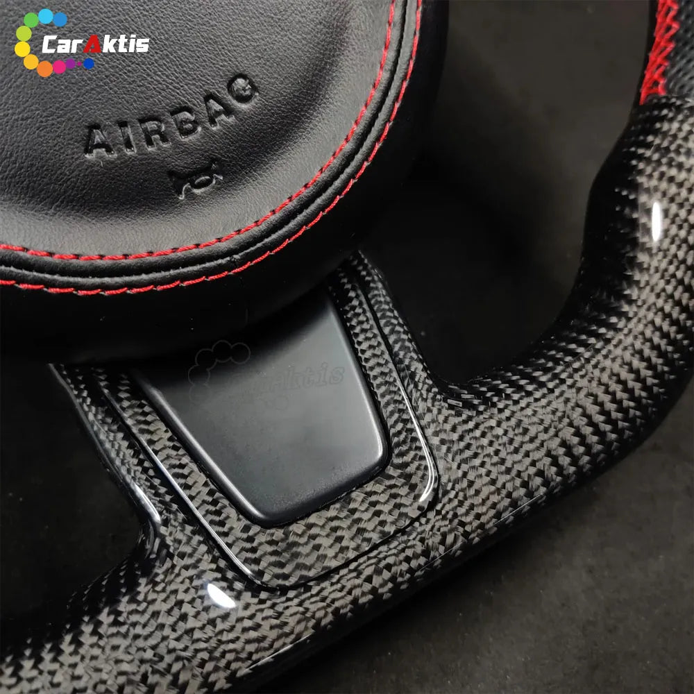 Jaguar F-Type Racing-Grade Flat-Bottom Carbon Fiber Steering Wheel: Increases legroom and optimizes handling performance.
