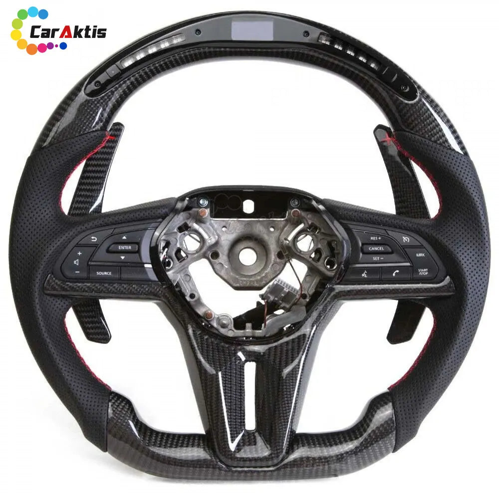 Bare frame of Nissan GTR R35 carbon fiber steering wheel featuring red stitching and perforated leather grips.