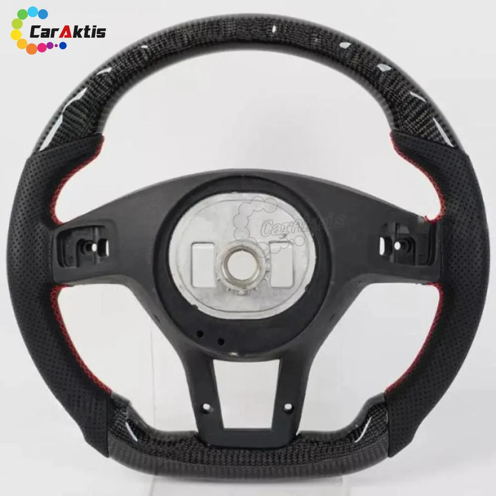 2008-2014 Mercedes W204 custom carbon fiber steering wheel core with red contrast stitching.