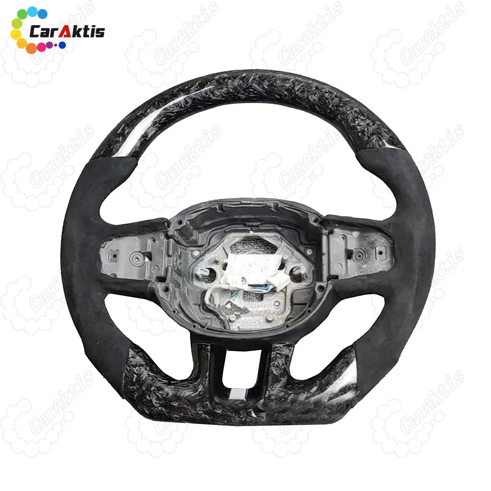 Forged Carbon Fiber Steering Wheel with Black Alcantara Grips for Volvo XC40 2020+ models.