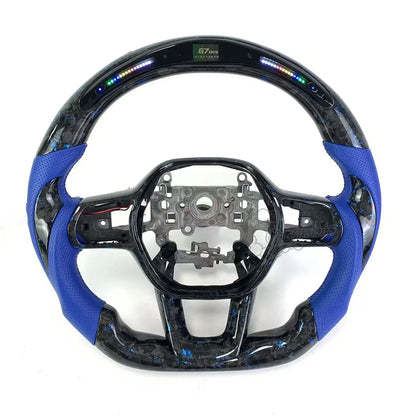 10th_gen_Civic steering_wheel Close-up of the unique blue-infused forged carbon fiber texture, showcasing a marble-like finish for luxury automotive interiors.