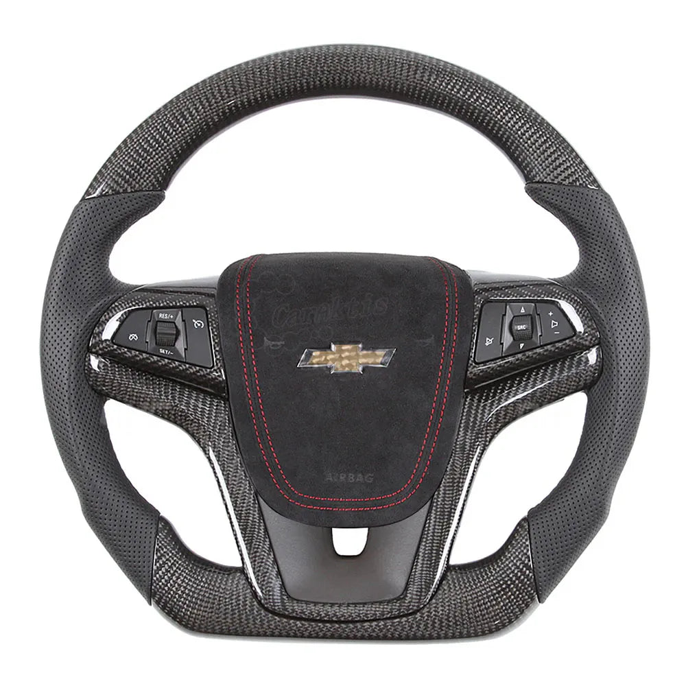 Custom carbon fiber sport steering wheel for 2012-2024 Chevrolet Camaro featuring black perforated leather grips, a premium Alcantara airbag cover with red stitching, and a flat bottom design.