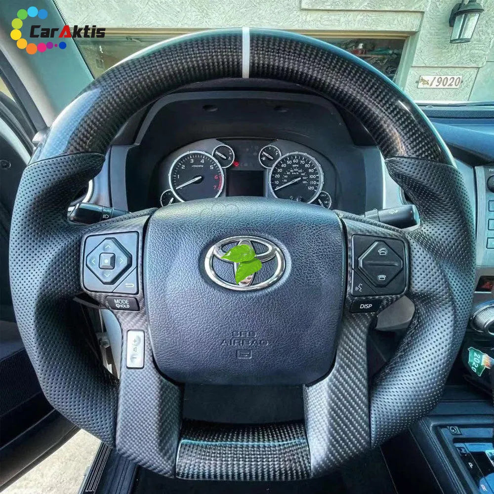 Toyota 4Runner custom steering wheel featuring premium carbon fiber and perforated leather.