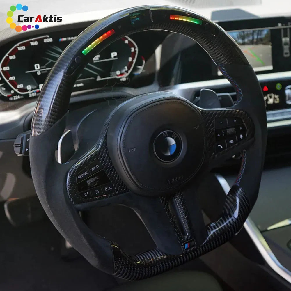 Detail view of the LED RPM shift light display on a BMW custom steering wheel
