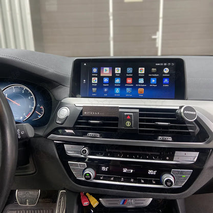 Android head unit display with app icons installed in BMW X3 F25 X4 F26 central dashboard.