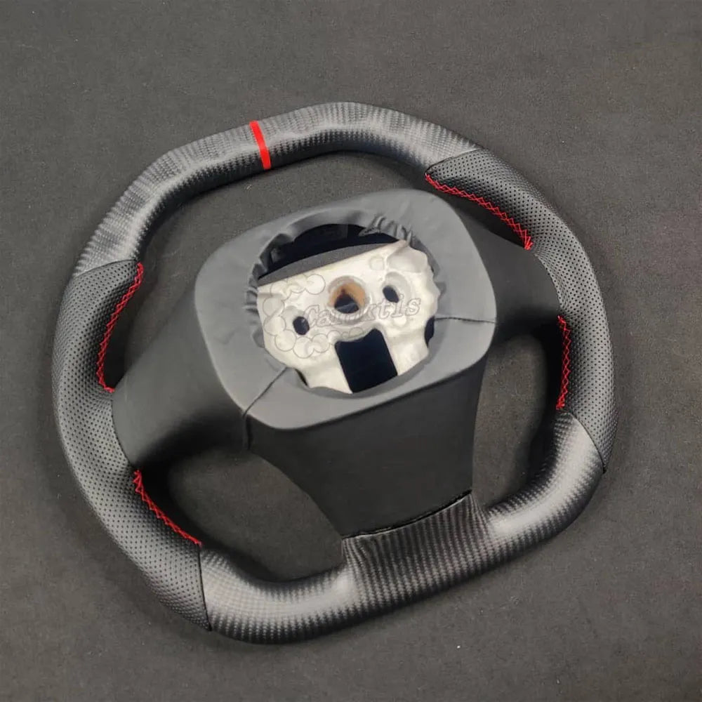 Custom matte carbon fiber and leather steering wheel for 2006-2013 Corvette C6, top-down perspective.