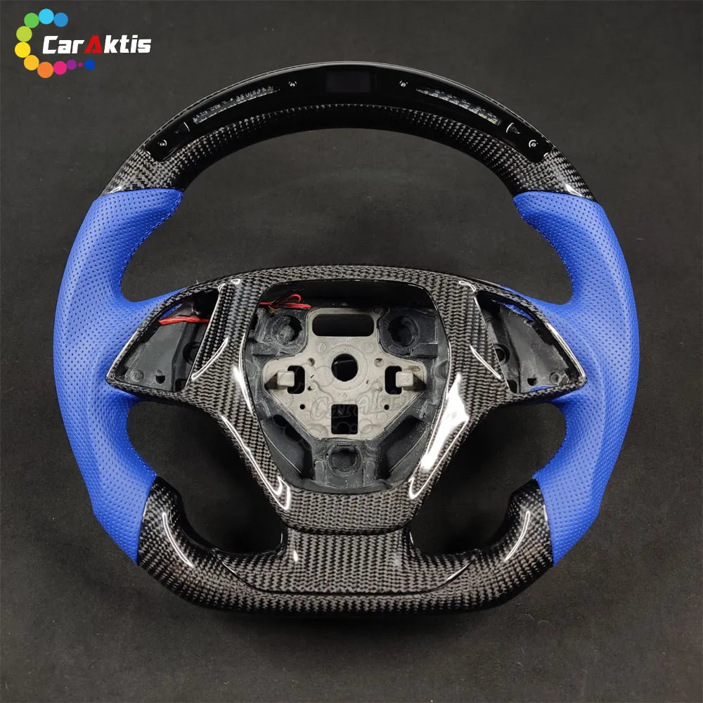 Custom C7 Corvette carbon fiber steering wheel with integrated LED RPM shift light display and black leather grips.