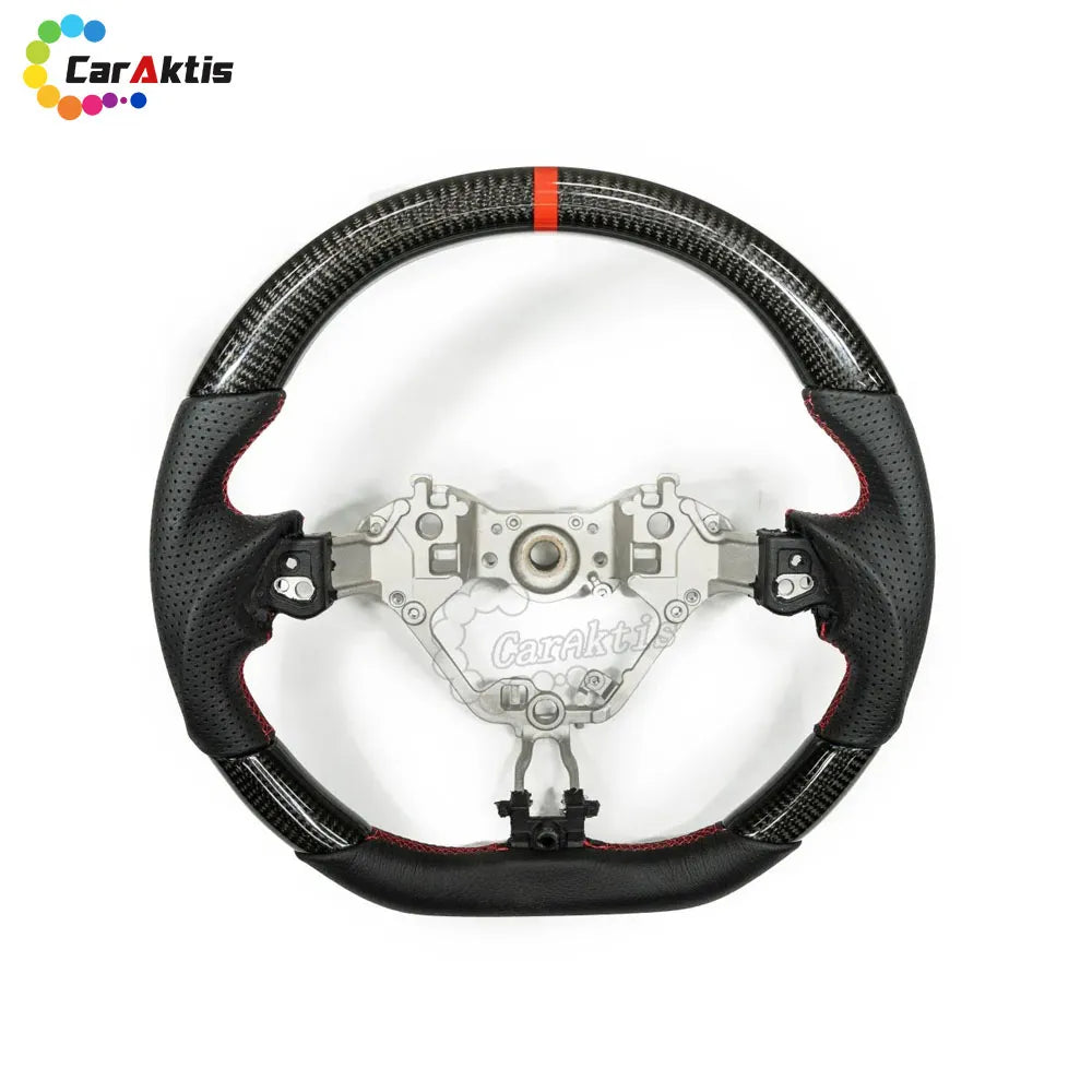 Top-down view of a custom D-shape steering wheel combining glossy carbon fiber and breathable leather.