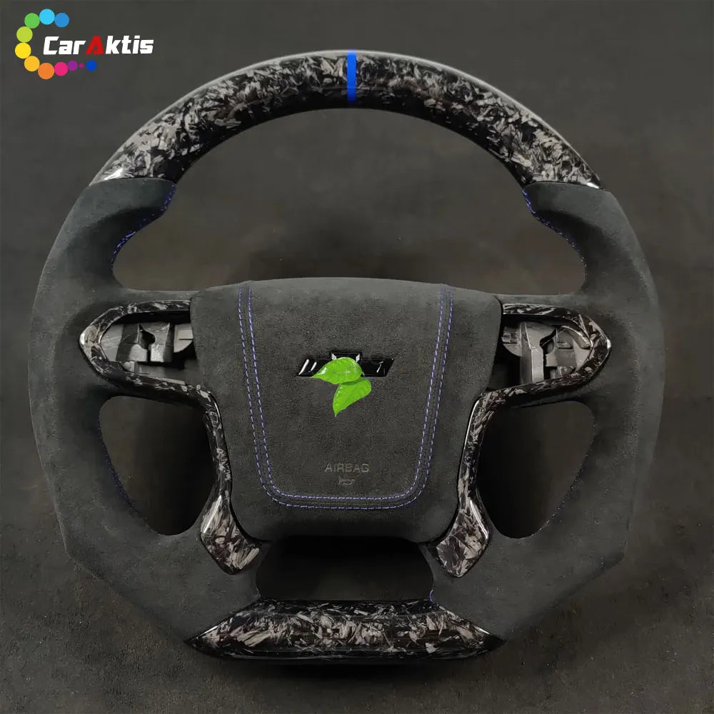 Custom Chevrolet Tahoe steering wheel featuring forged carbon fiber, black Alcantara.