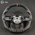 A custom-designed steering wheel featuring a black-and-white forged carbon fiber pattern, with genuine leather grips on both sides that provide exceptional slip resistance and a comfortable hold.