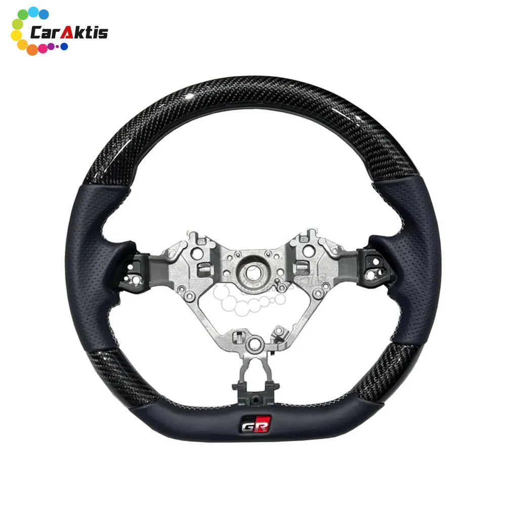 Racing-inspired D-cut steering wheel with perforated leather sides for enhanced legroom and sporty feel.