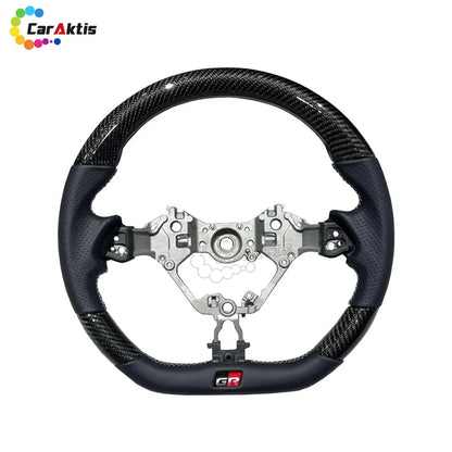 Racing-inspired D-cut steering wheel with perforated leather sides for enhanced legroom and sporty feel.