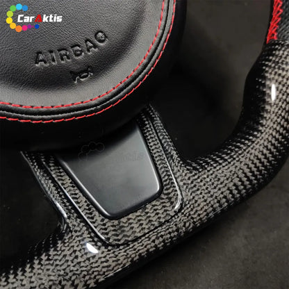 Jaguar F-Type Racing-Grade Flat-Bottom Carbon Fiber Steering Wheel: Increases legroom and optimizes handling performance.