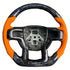 Close-up of the premium orange perforated leather grips on a Ford Raptor steering wheel, perfect for matching the factory Code Orange interior accents.