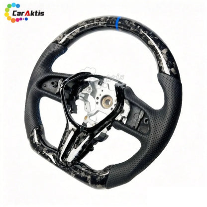 forged carbon with perforated leather steering wheel infiniti