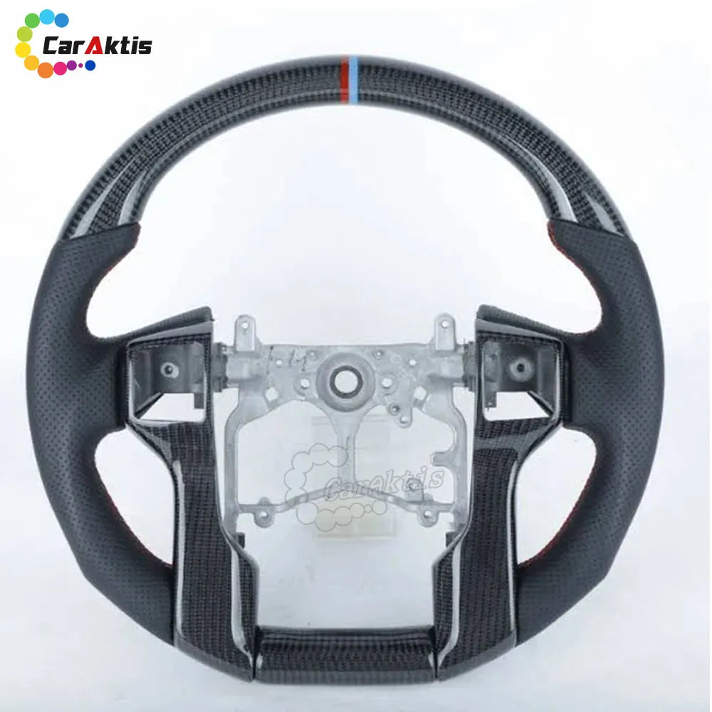 Premium gloss carbon fiber steering wheel with black perforated leather grips.