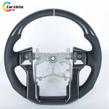 Premium gloss carbon fiber steering wheel with black perforated leather grips.