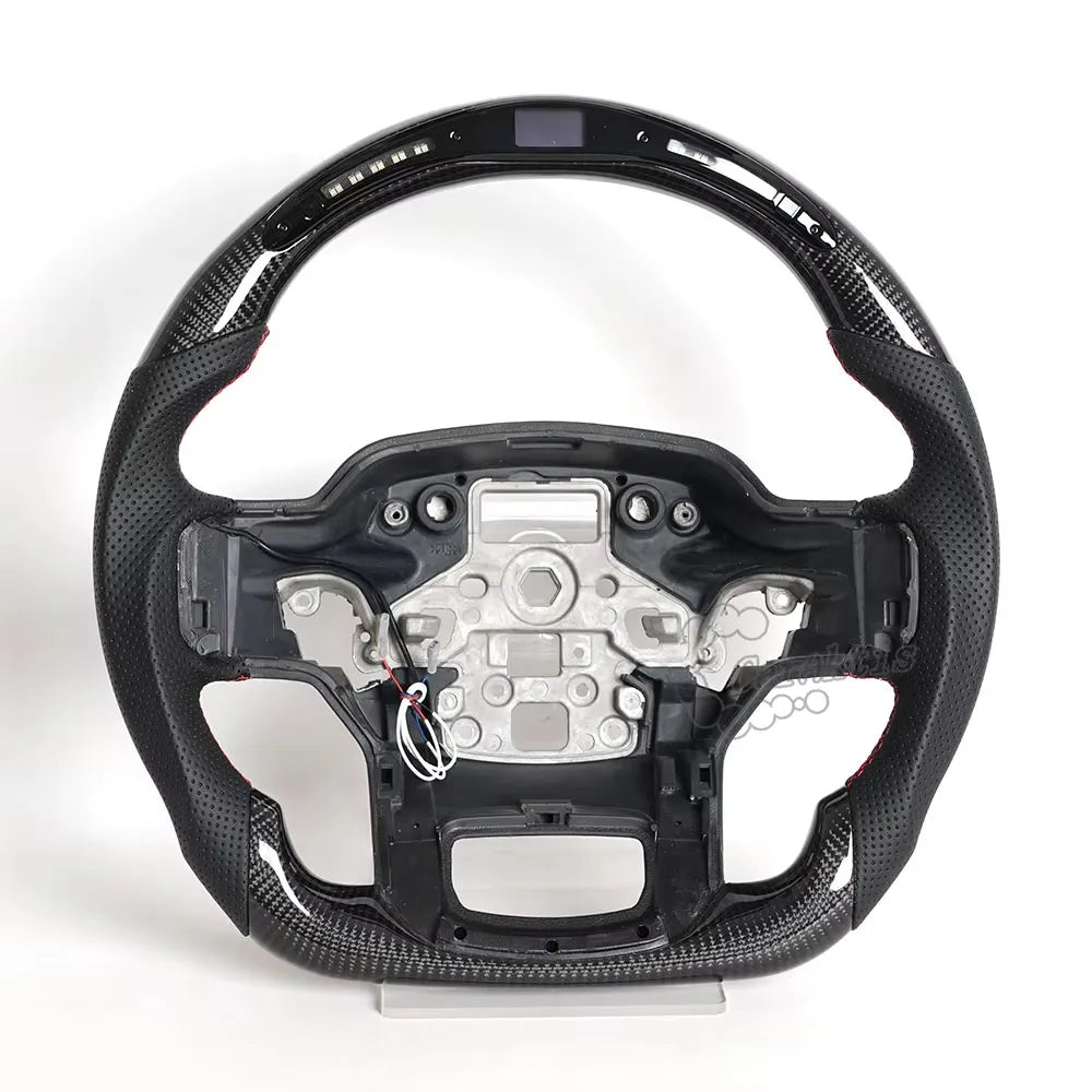 erformance LED carbon fiber steering wheel for Ford F-150 Raptor (2015-2026) featuring gloss black finish, real-time shift light indicator, and sporty red stitching.