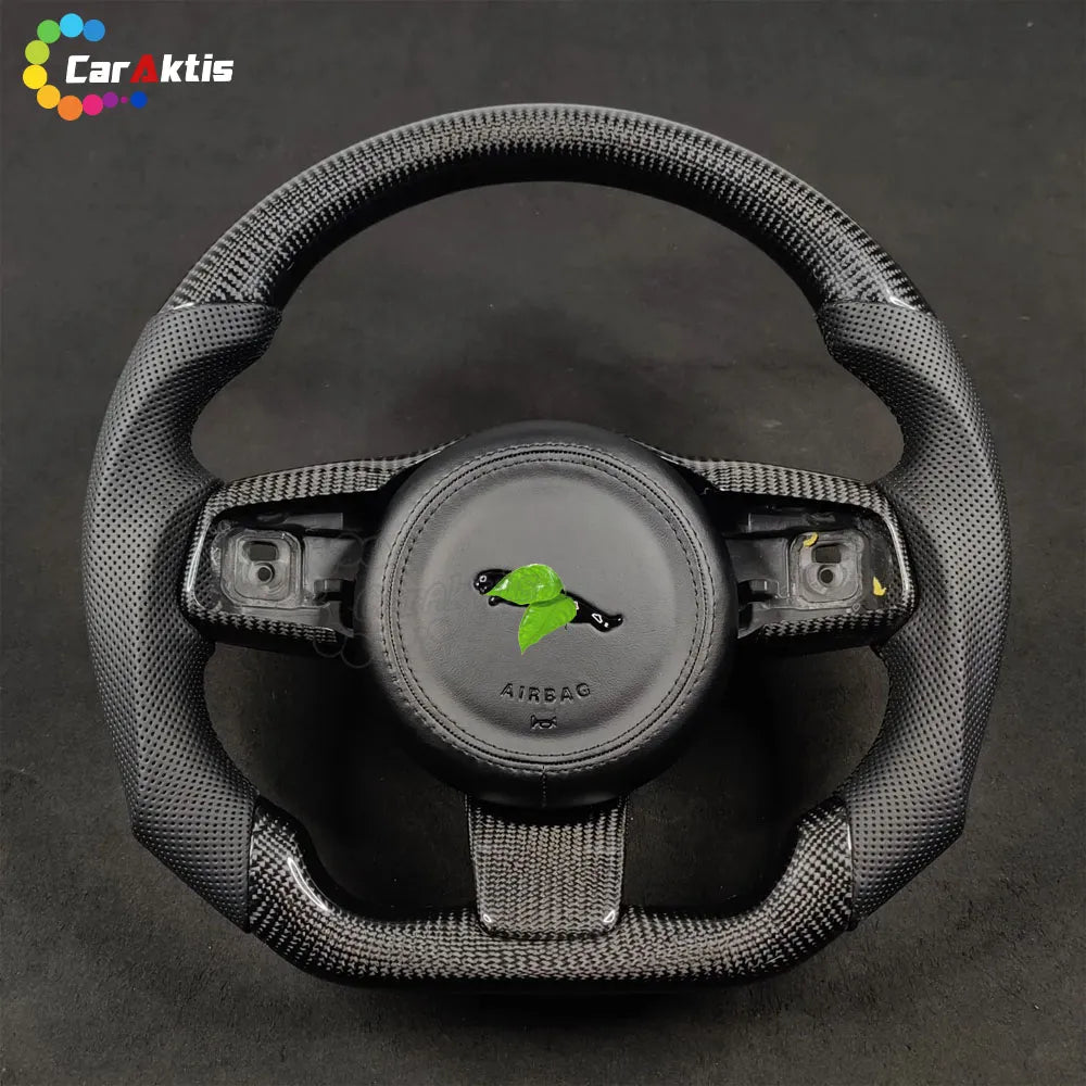 Jaguar F-Type Custom Steering Wheel: Featuring perforated, breathable leather on both sides to enhance comfort during long-distance driving.