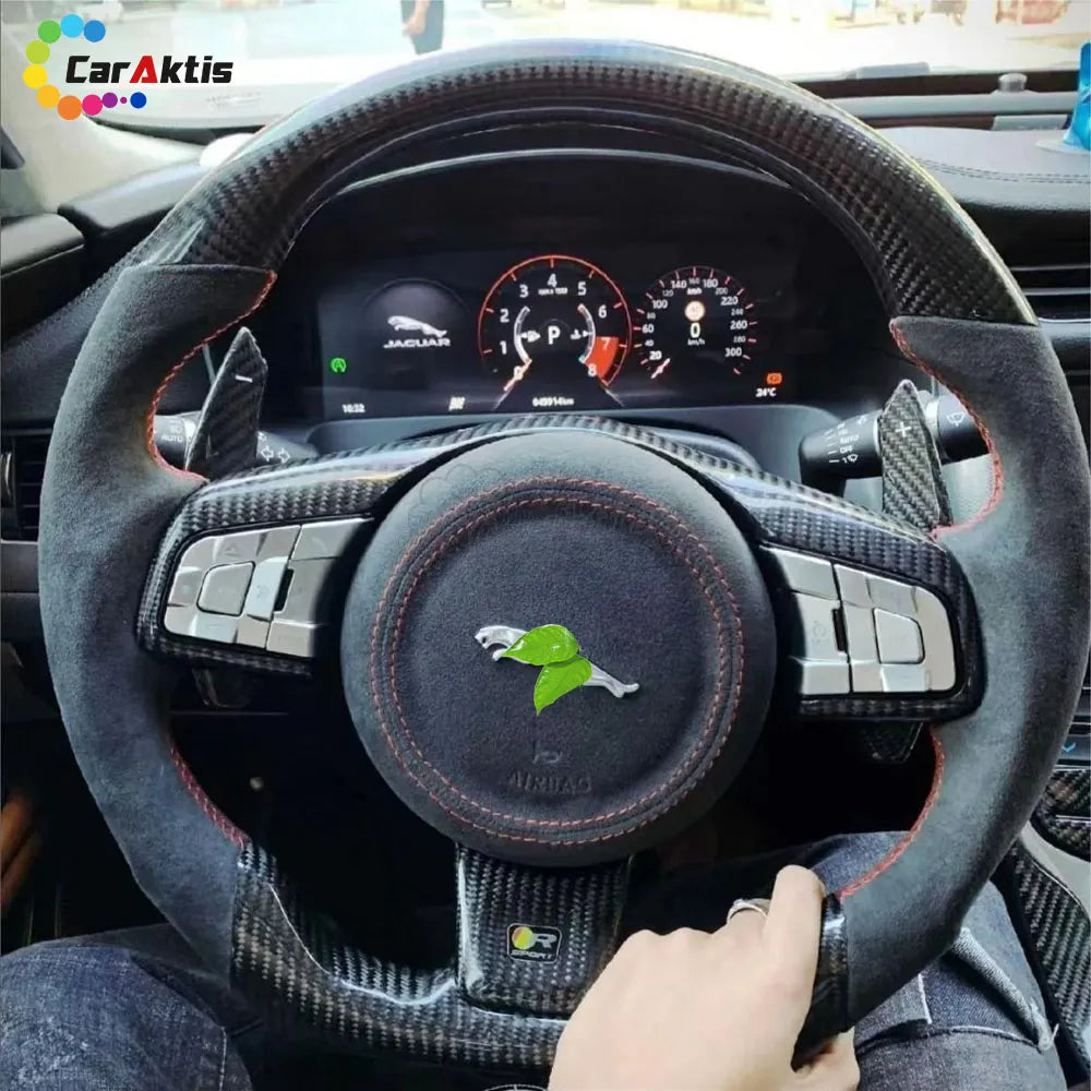 A custom steering wheel—featuring glossy carbon fiber paired with an Alcantara suede grip—creates the ultimate sporty atmosphere for the Jaguar F-Type.