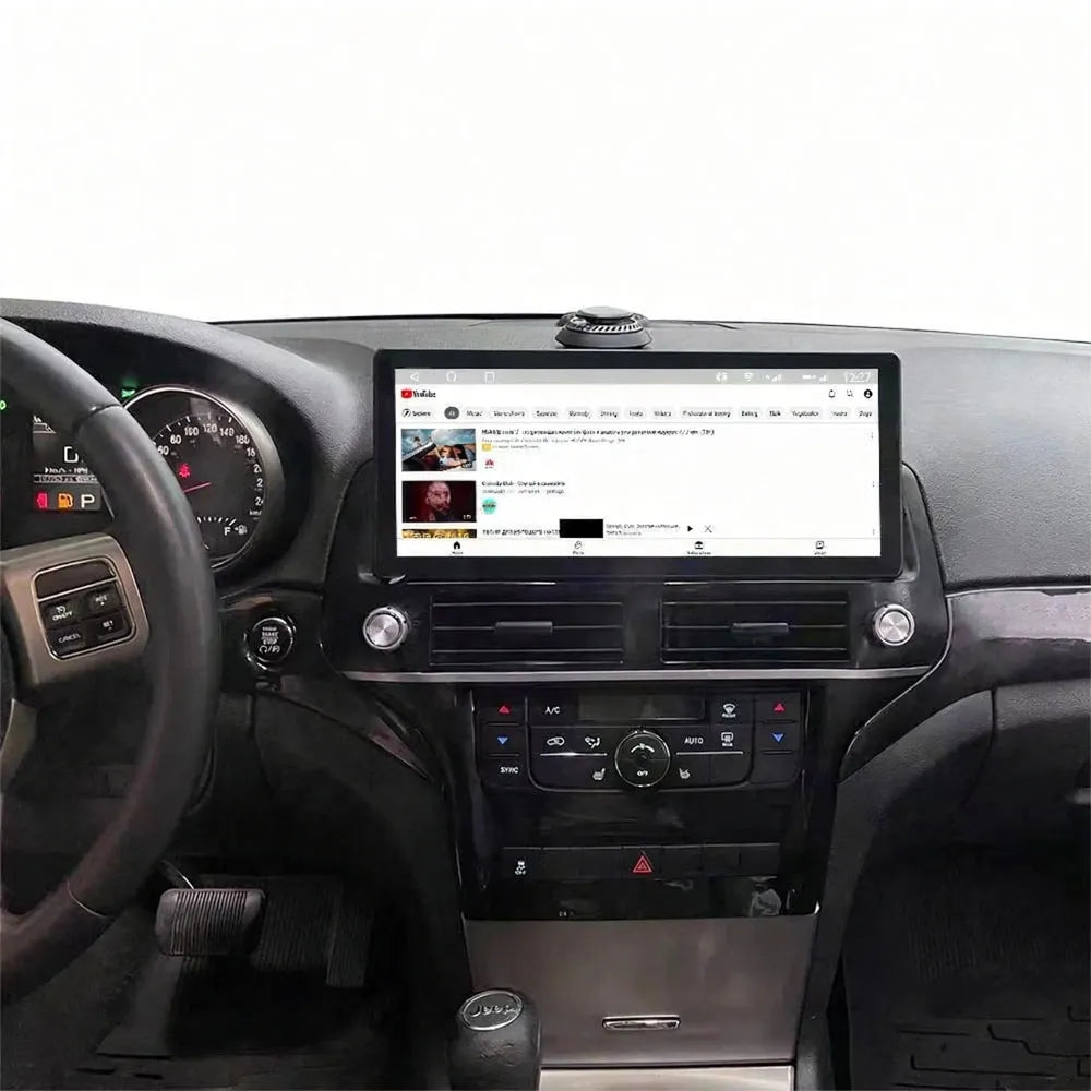 12.3 inch touchscreen Android head unit playing online media on Jeep Grand Cherokee dashboard