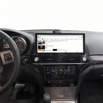 12.3 inch touchscreen Android head unit playing online media on Jeep Grand Cherokee dashboard
