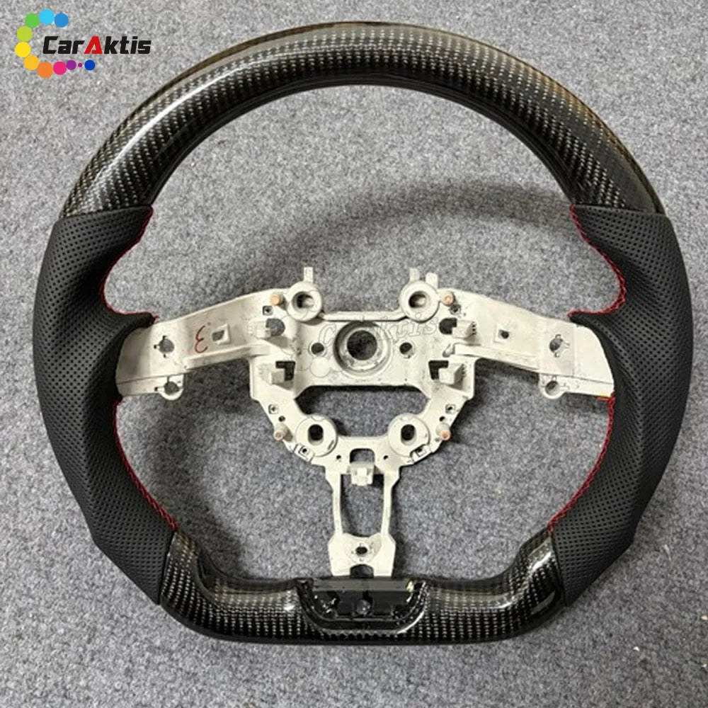 Glossy Carbon Fiber and Black Perforated Leather Steering Wheel Base for Kia Stinger.