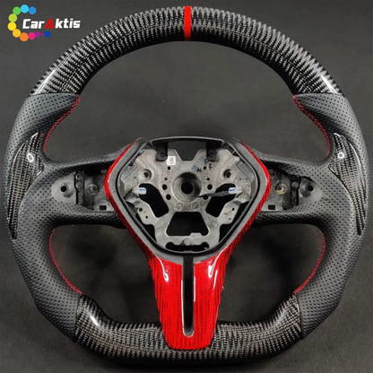 Kia Stinger Custom Steering Wheel featuring Red Carbon Fiber Trim and Perforated Leather Grips.