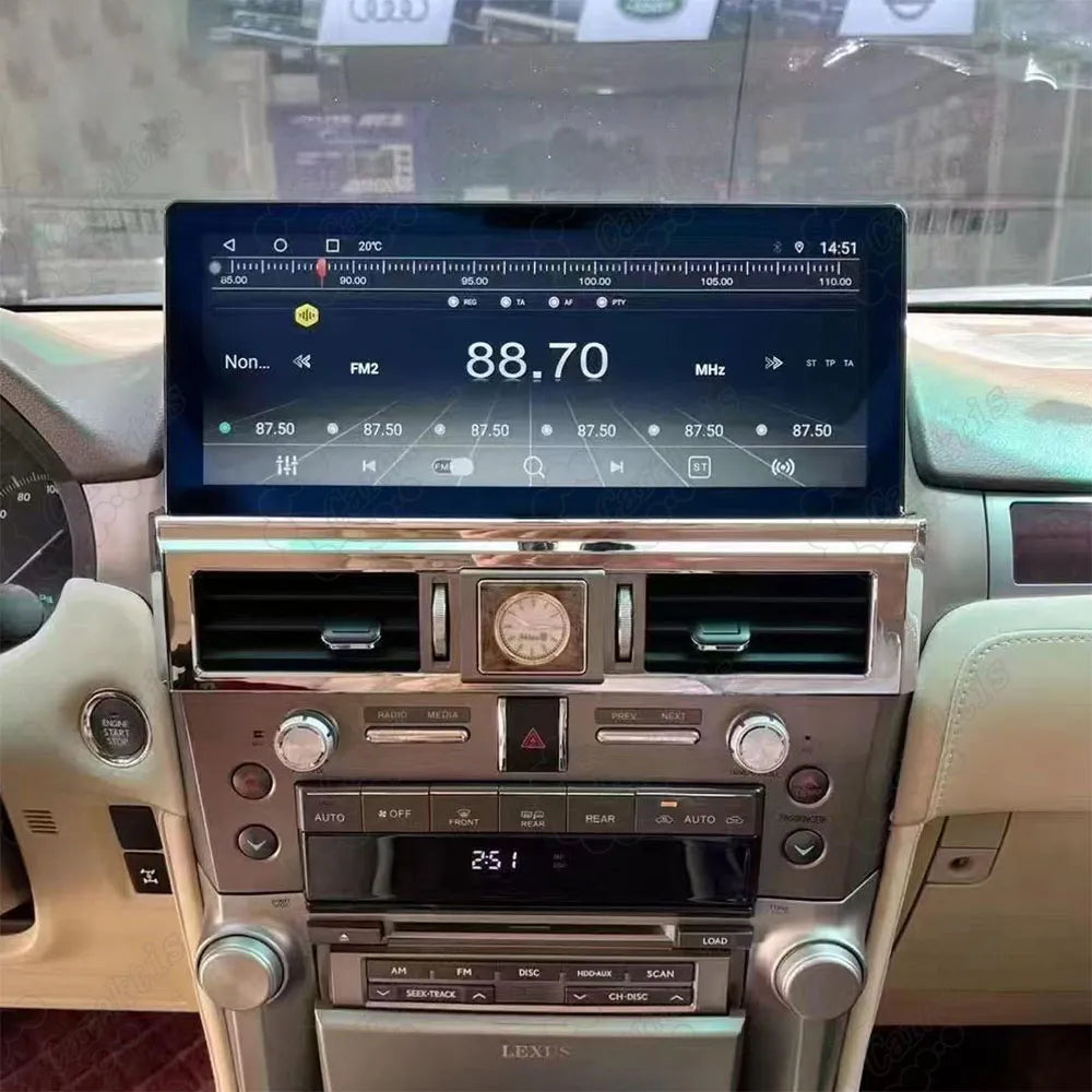 FM/AM digital radio player interface on the 12.3-inch touchscreen installed in Lexus GX460 interior dashboard.