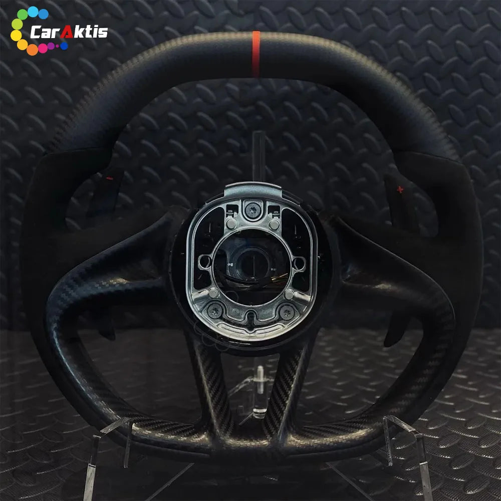 Custom McLaren 720S steering wheel in matte carbon fiber and Alcantara with a red 12 o&