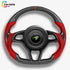 Sporty McLaren steering wheel upgrade with carbon fiber finish and vibrant red perforated leather grips.