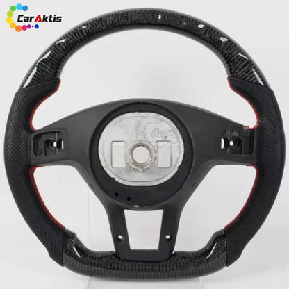 2008-2014 Mercedes W204 custom carbon fiber steering wheel core with red contrast stitching.