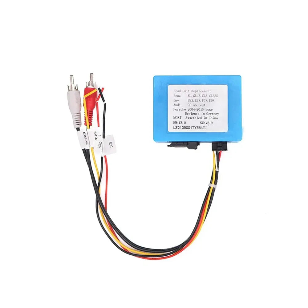 Fiber optic decoder box connected with power wiring harness and RCA audio input connectors for Mercedes car radio installation