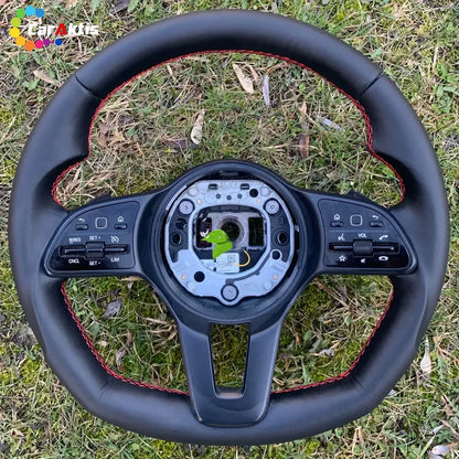 Upgraded leather steering wheel for Mercedes Sprinter W907 with sporty red contrast stitching and multi-function buttons.