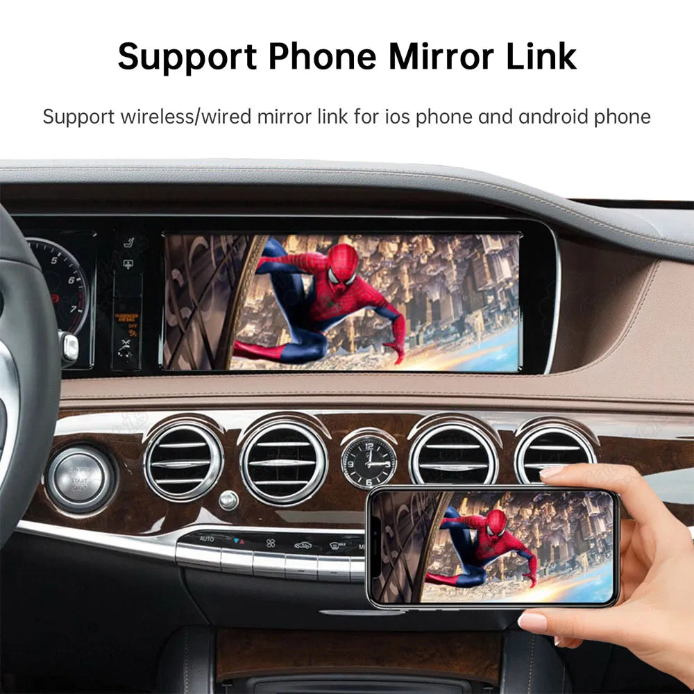 Phone mirror link feature displaying smartphone screen wireless mirroring video playback on the wide Mercedes dashboard monitor.
