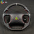 Mitsubishi 3000GT GTO custom steering wheel featuring carbon fiber, perforated leather, red stitching, and 3000GT logo.