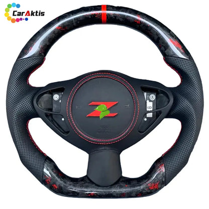 Forged carbon fiber steering wheel for Nissan 370Z with red flake accents, red center stripe, and red stitching.