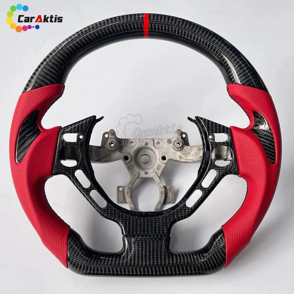 Sporty Nissan GT-R R35 carbon fiber steering wheel featuring vibrant red perforated leather and a red center stripe.