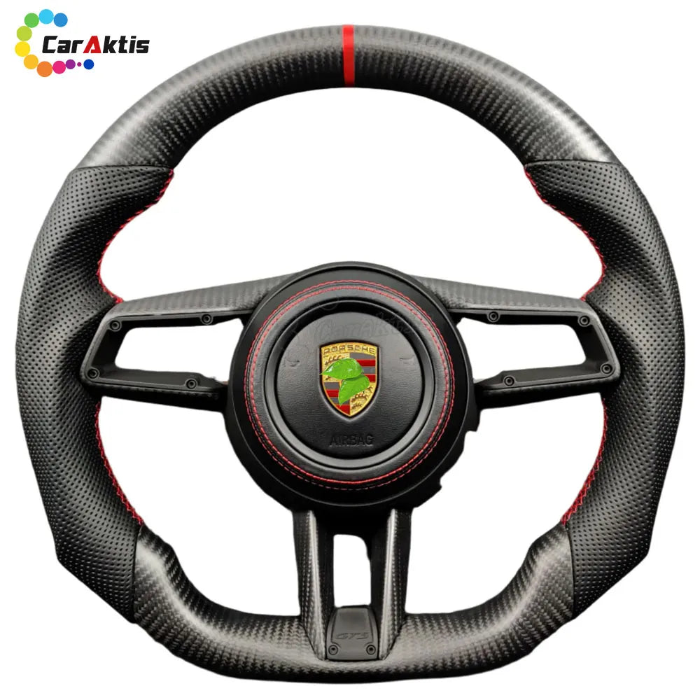 Custom Porsche 992 GTS steering wheel with matte carbon fiber, perforated leather grips, and red contrast stitching.