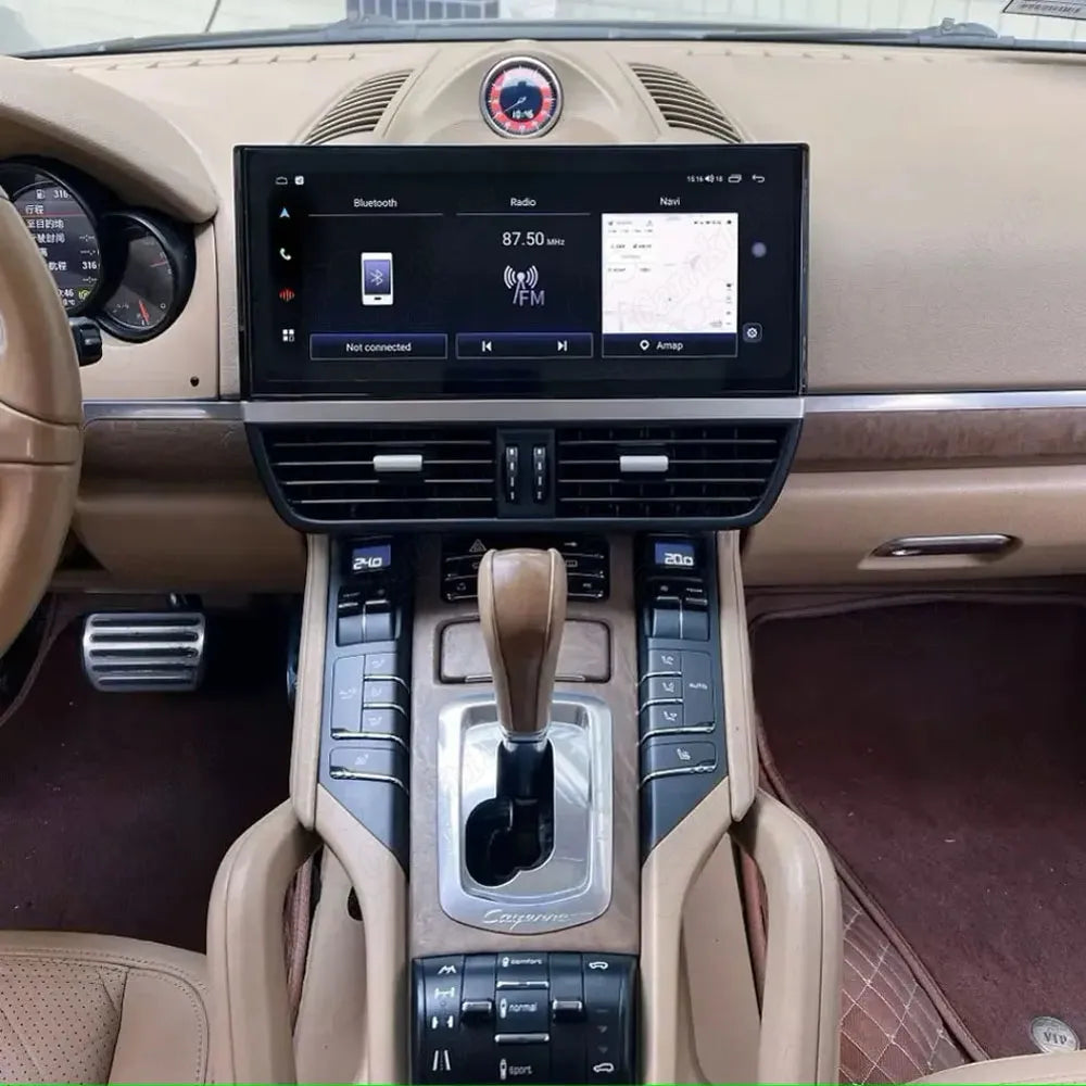 Real-life photo of the 12.3 inch Android multimedia screen fully installed in a Porsche Cayenne 2010-2017, showing perfect fit and luxury interior integration.