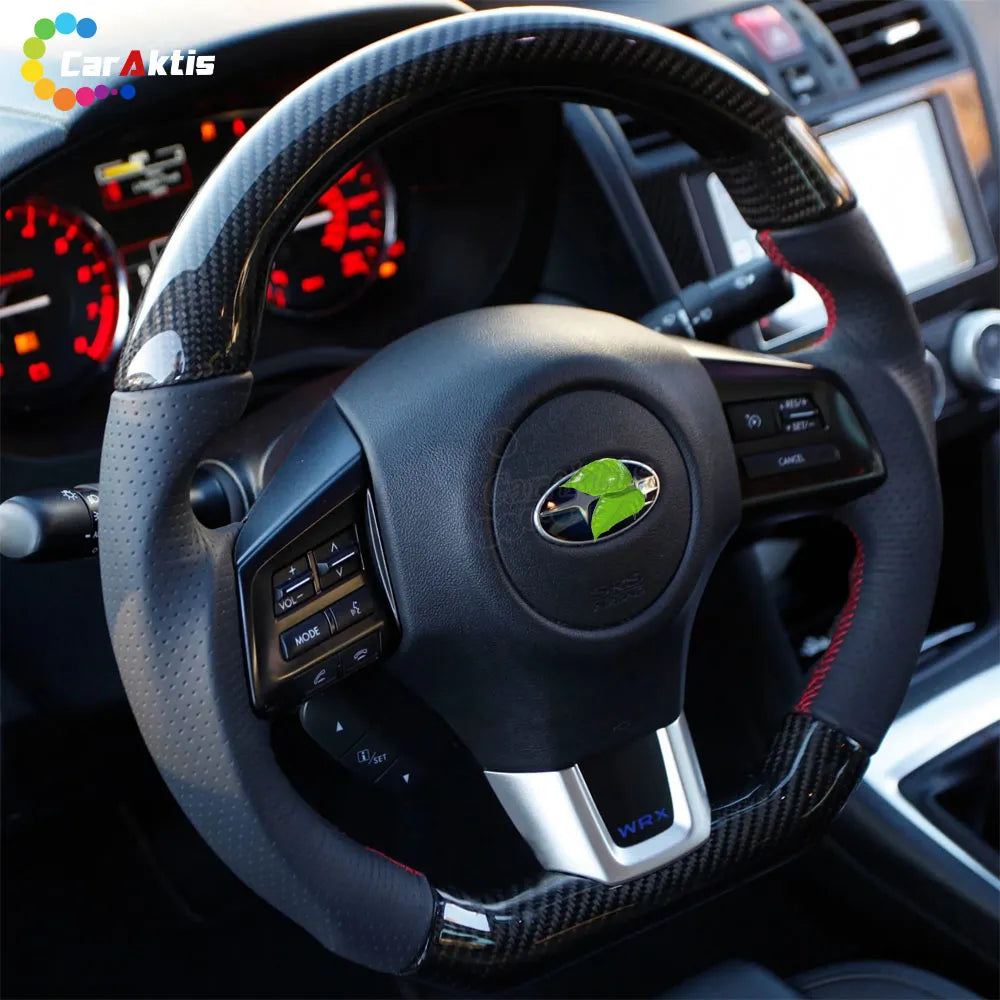 Interior view of a 2015-2021 Subaru WRX STI featuring a custom carbon fiber steering wheel with red stitching