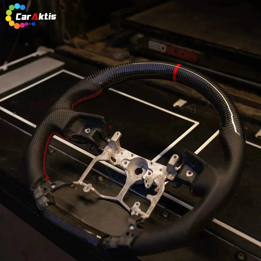 Glossy carbon fiber steering wheel with red 12 o&