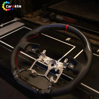 Glossy carbon fiber steering wheel with red 12 o&
