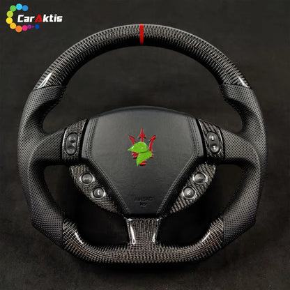 High-performance custom steering wheel with premium twill weave carbon fiber and breathable perforated leather grips.