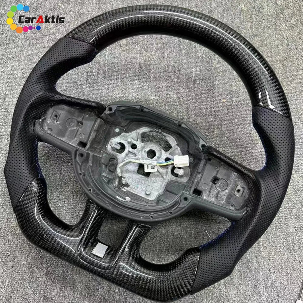 Custom Carbon Fiber Steering Wheel with Perforated Leather and Blue Stitching for Volvo XC40 2020+.