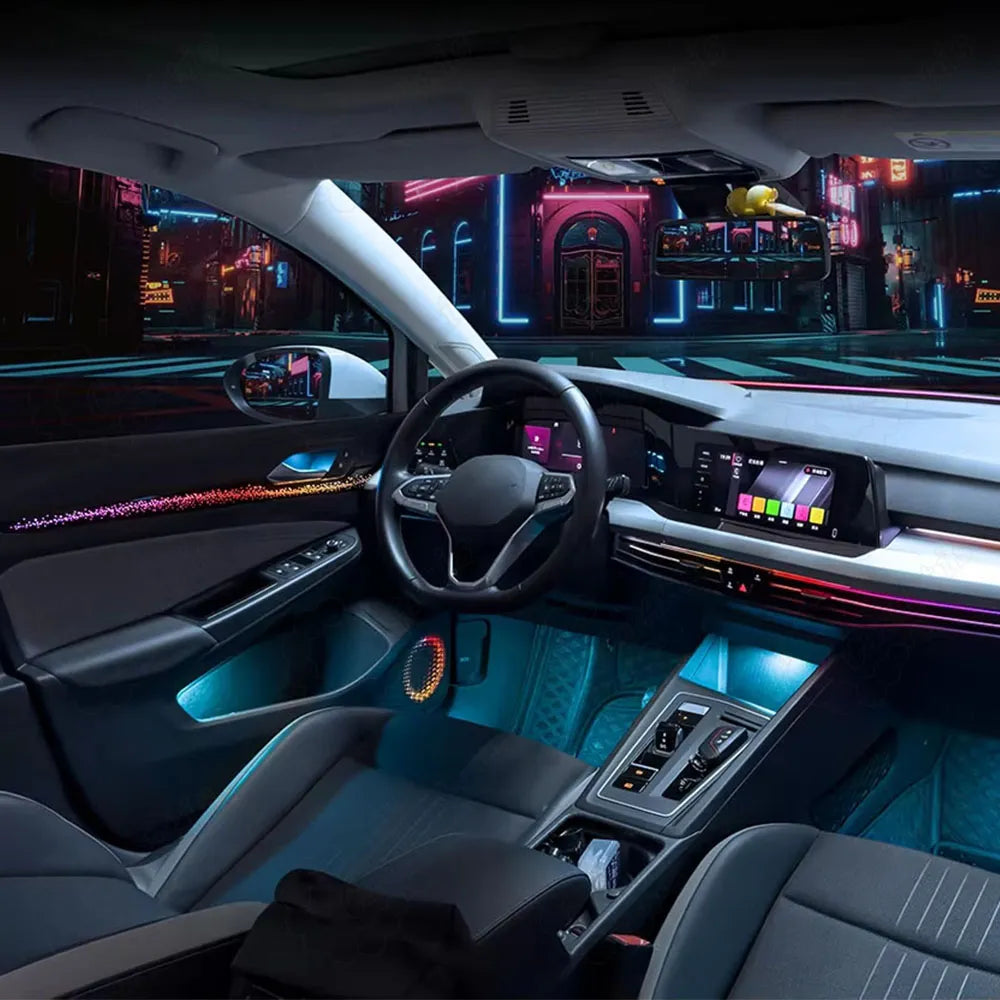 Modern digital cockpit ambiance featuring a customized multi-color LED light strip set inside a Volkswagen Golf 8.